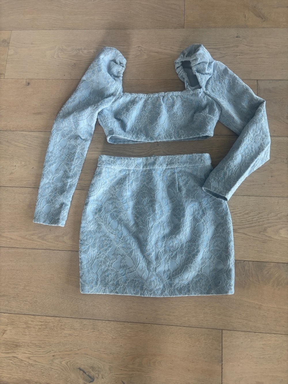 Need wardrobe Women's Lace Mini Skirt and crop top in Light Blue. High end